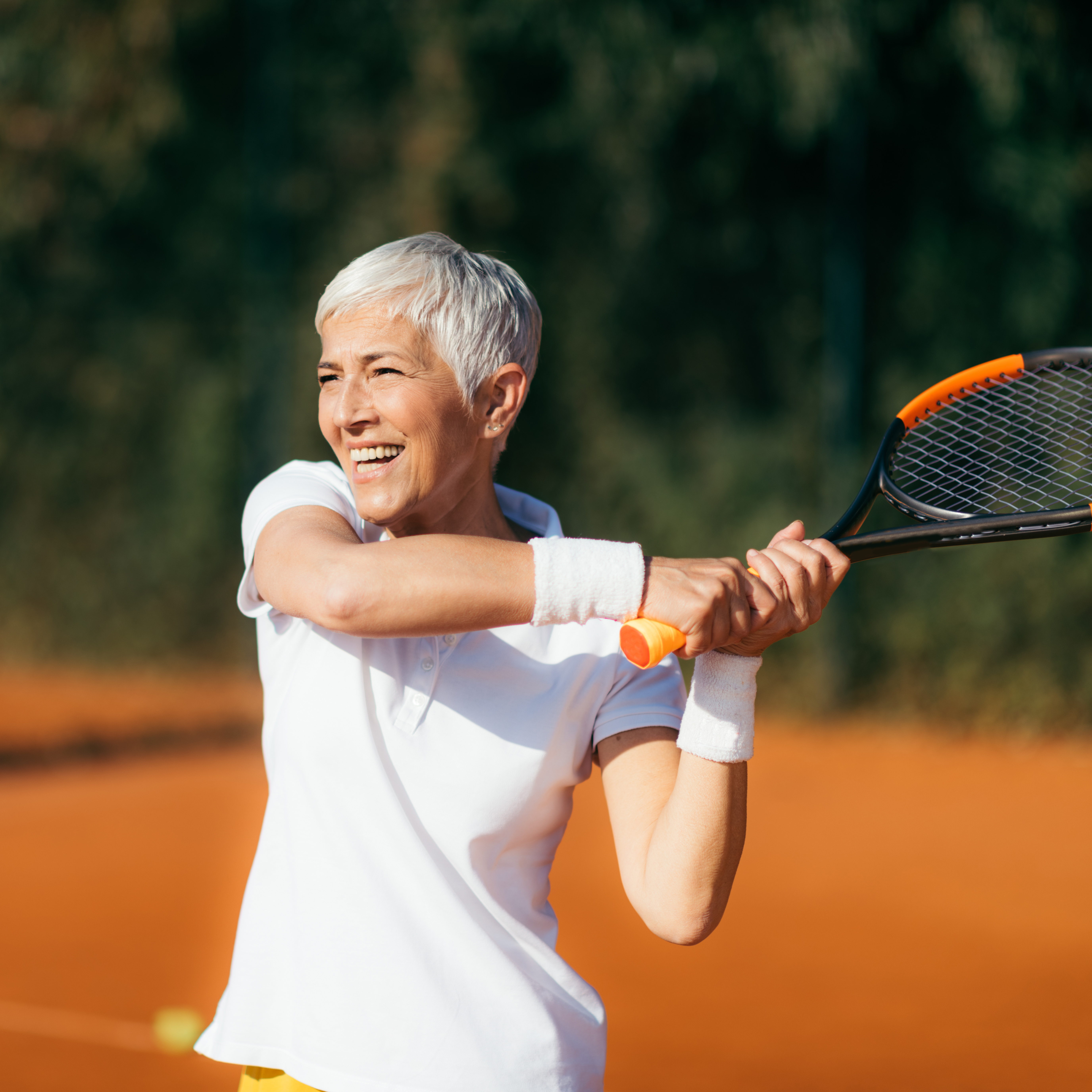 Active Lifestyle Seniors – Positive Mature Woman Playing Tennis Recreationally